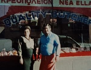old photo of a couple in front of the butcher shop in Yarraville